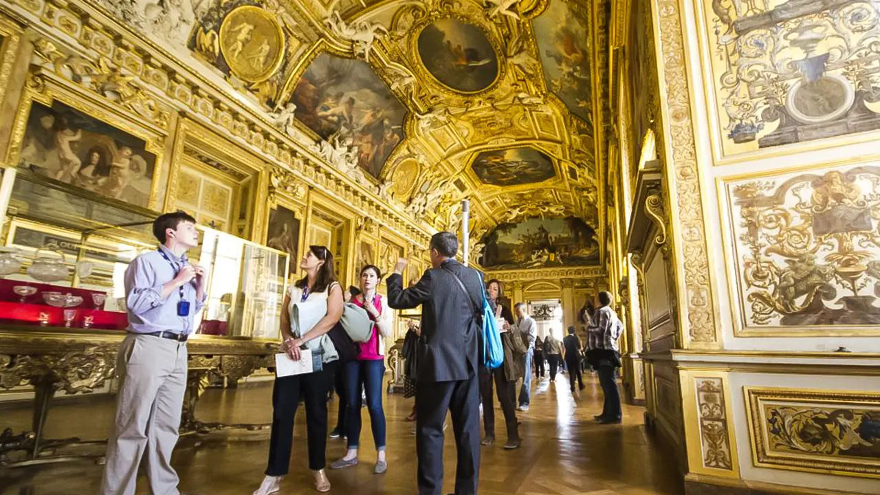 Louvre museum with a tour guide