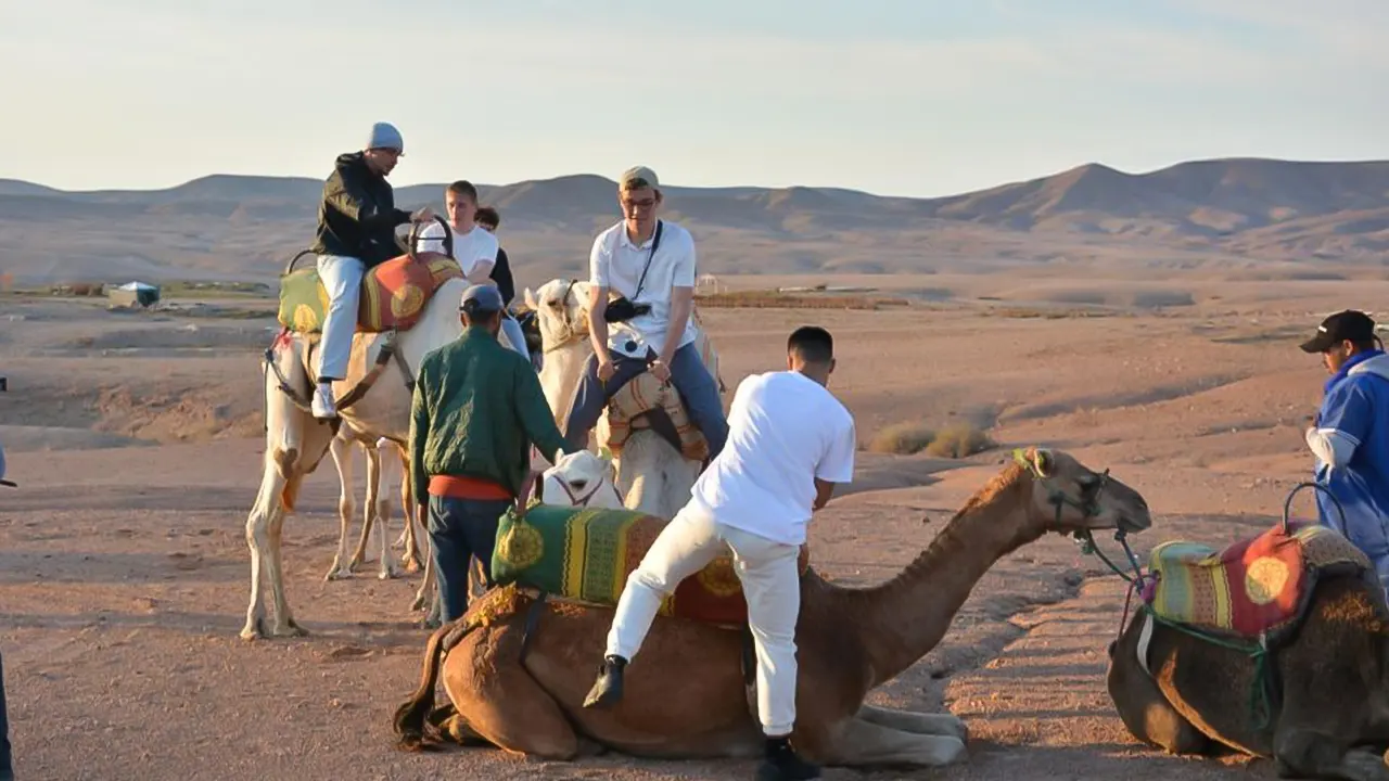 Agafai desert dinner with a camel ride at sunset