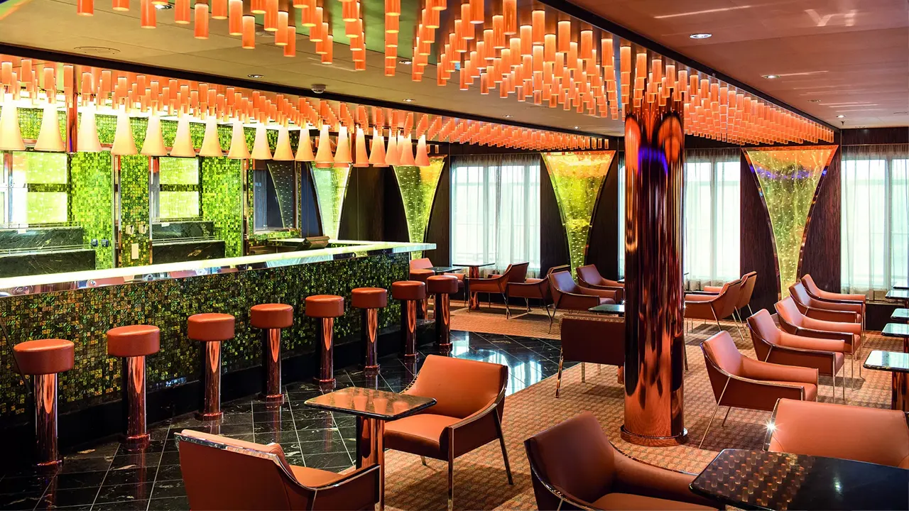 Diadema is a luxurious cruise ship, built in 2010. It boasts elegant design, lavish amenities, and a variety of entertainment options, along with gourmet dining experiences.